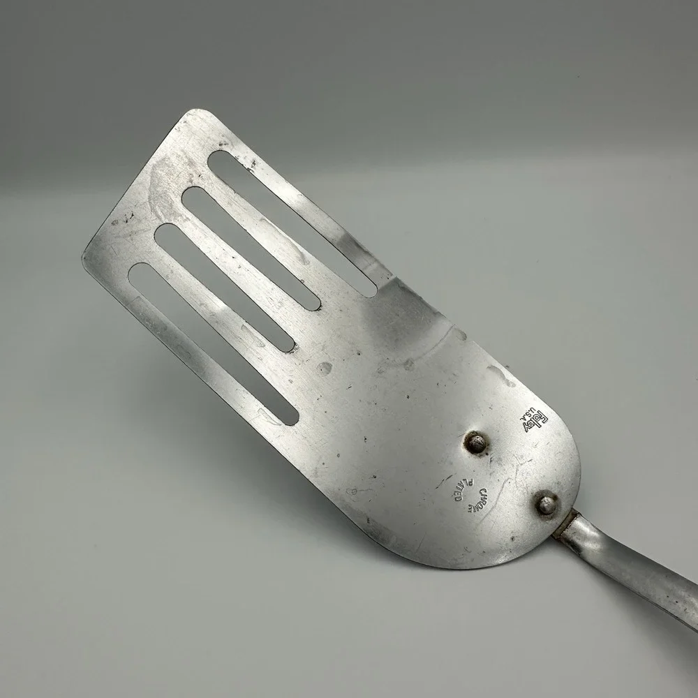 Vtg FOLEY USA Slotted Angled Spatula Chrome Black Plastic Handle Kitchen Utensil
